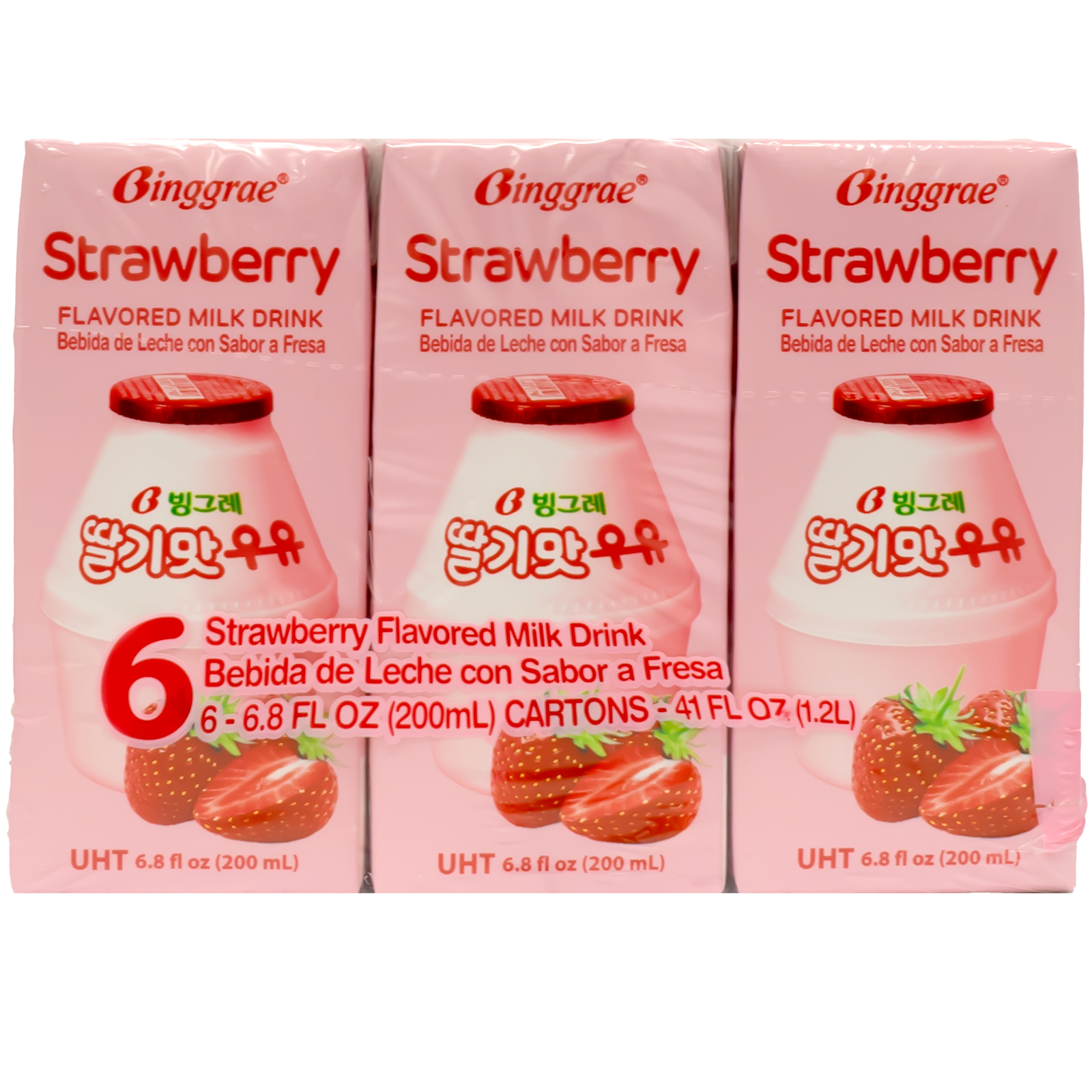 Front of package. The package features a bright pink design that instantly catches the eye. Adorned with images of fresh strawberries and a stylish depiction of the milk drink bottle, it exudes a fun and vibrant appeal. The bold red text adds to the striking visual appeal, making it stand out on any shelf.