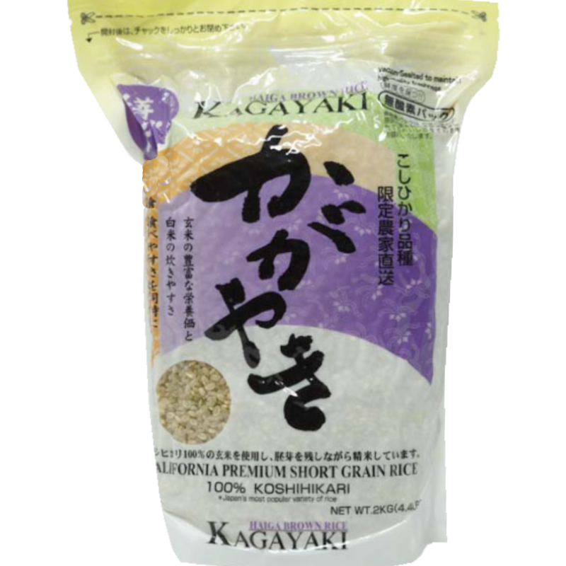 The package features a sophisticated design with traditional Japanese calligraphy, emphasizing its authenticity. The front showcases the rice grains through a small transparent window, highlighting the product's quality. The back provides detailed cooking instructions and nutritional information, ensuring you get the perfect rice every time.