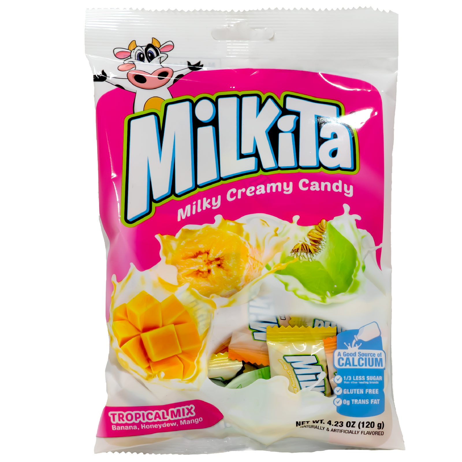 Front view of package. The packaging features vibrant, colorful images of juicy banana, honeydew, and mango slices surrounded by splashes of creamy milk, creating an inviting and mouthwatering visual appeal. A playful cartoon cow at the top adds a fun touch, while the bottom highlights the tropical mix of flavors. The package also prominently displays a badge indicating that the product is a good source of calcium, has one-third less sugar, is gluten-free, and contains zero trans fats.