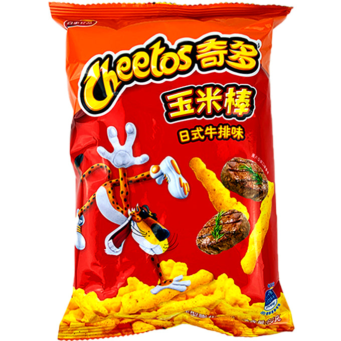 Front of package. The packaging is vibrant red, featuring the iconic cheetah mascot in an energetic pose, emphasizing the fun and excitement of the snack. The bag displays images of the puffed corn sticks and a juicy steak, making it clear that this is a flavor-packed treat.