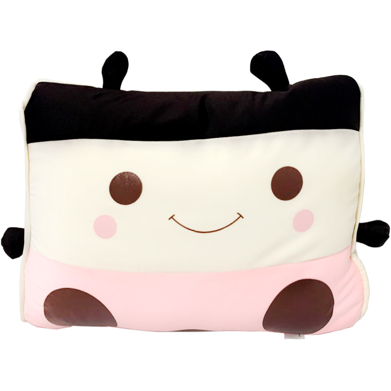 The pillow features a cute animal face with large, friendly eyes, rosy cheeks, and a sweet smile, set against a pastel background. The contrasting black accents add a playful touch, making it a standout piece in any decor.