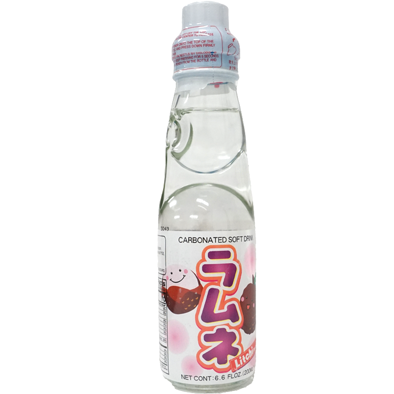 Clear bottle of carbonated lychee-flavored soft drink with label artwork.