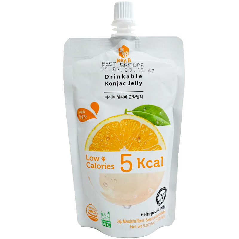 Front view of package. The package features a vibrant image of a fresh, sliced mandarin orange with dewy leaves, emphasizing the juicy and natural flavor of the jelly. The design is clean and modern, with clear text indicating the low-calorie content and halal certification, making it both appealing and informative.